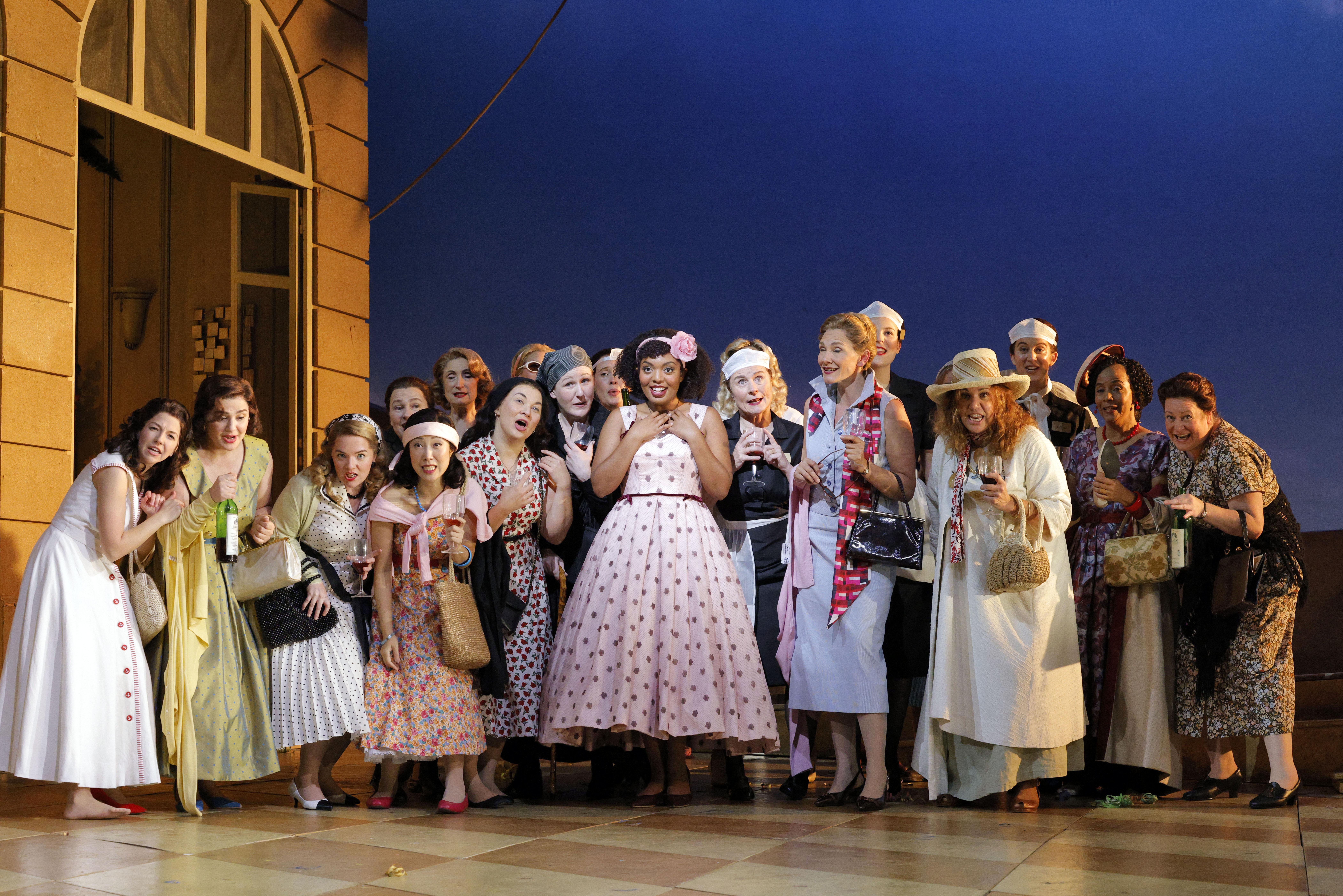  Second-year Adler Fellow, Arianna Rodriguez as Gianetta in L’elisir d’amore with members of the San Francisco Opera chorus.