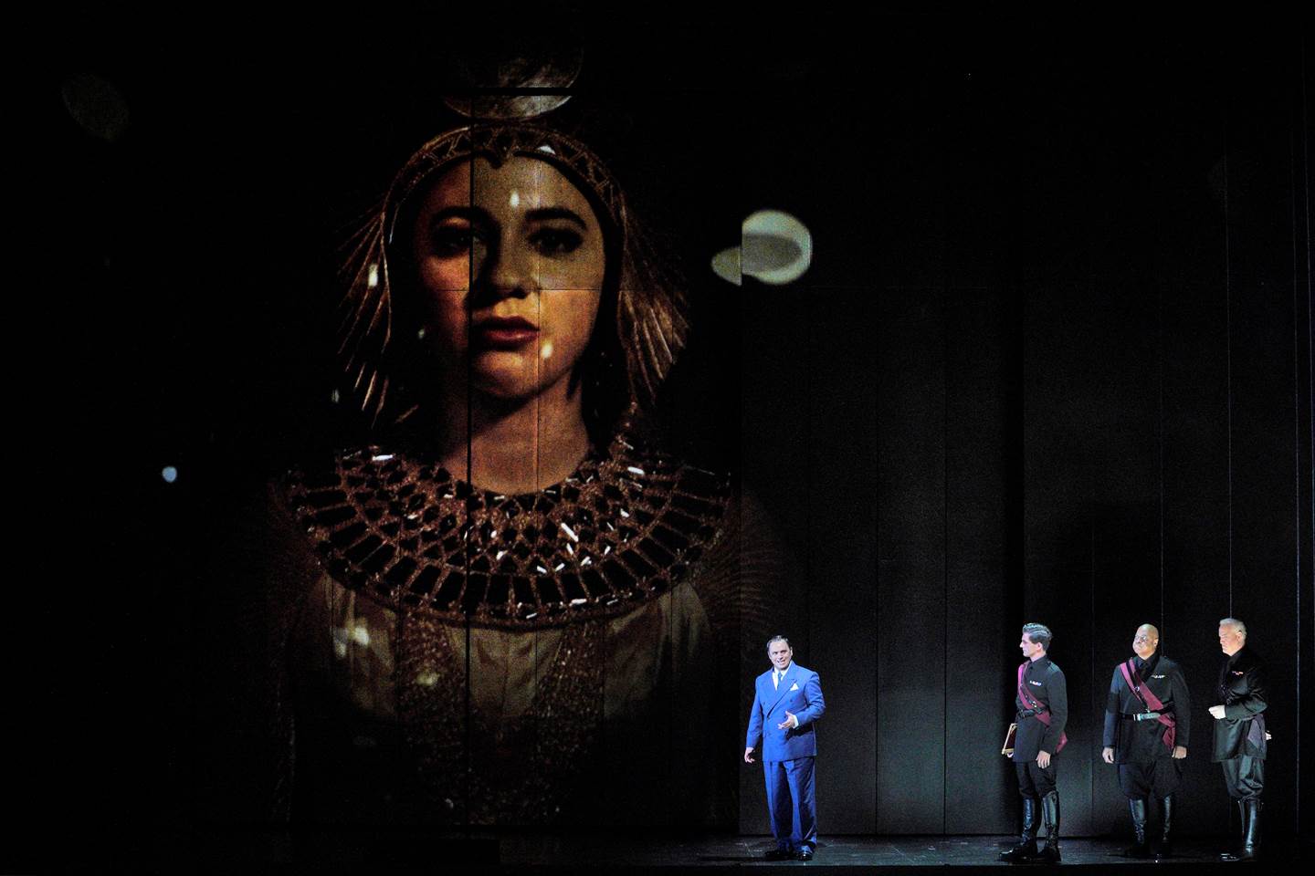 stage with a massive image of Amina Edris as Cleopatra