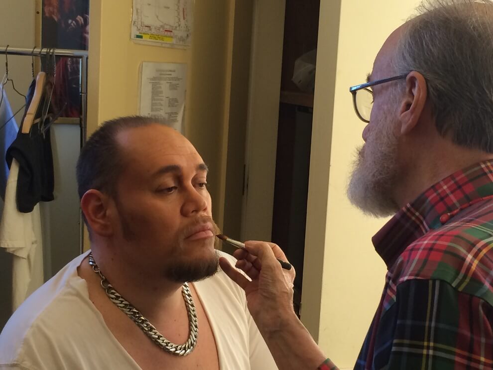 Bill darkening Quinn&rsquo;s beard with MAC mascara.