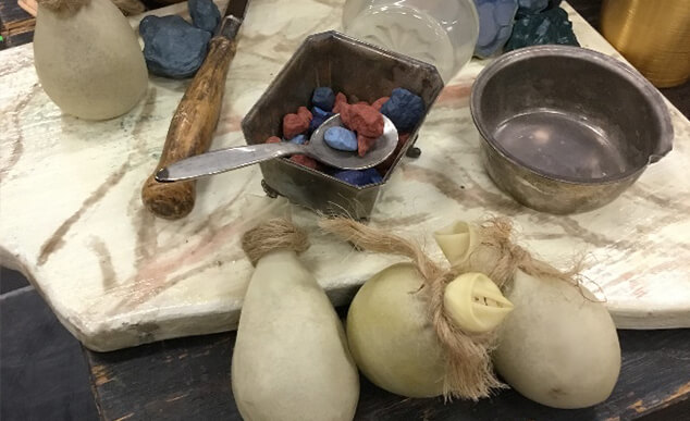 Research for the pockets of paint, using pig bladders. These were found in Thomas Gainsborough’s house; Cavaradossi’s paint set-up for Act I showing the 1800 painting tools.
