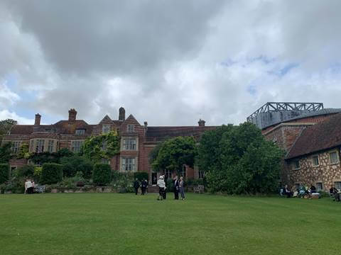 The historic manor house of Glyndebourne, with the opera house to the right.