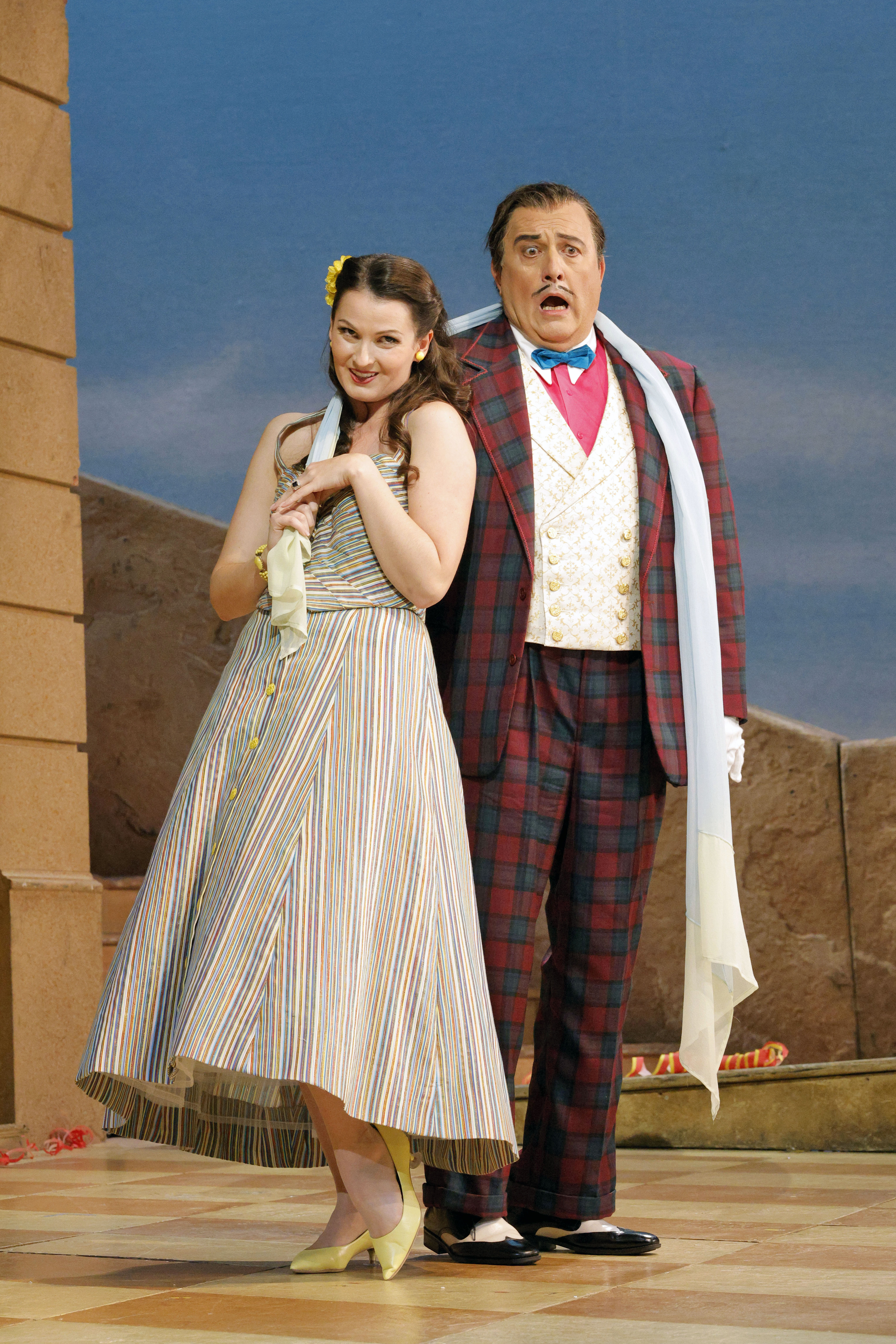 a man gasping standing next to a woman