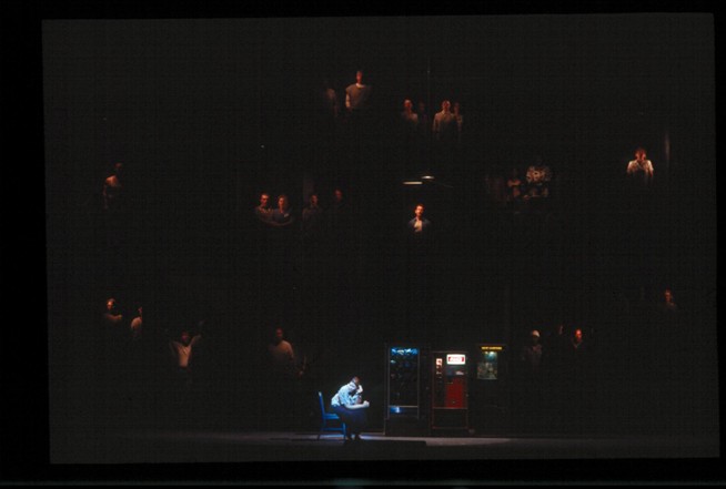 Stage scene with singer in front of vending machines
