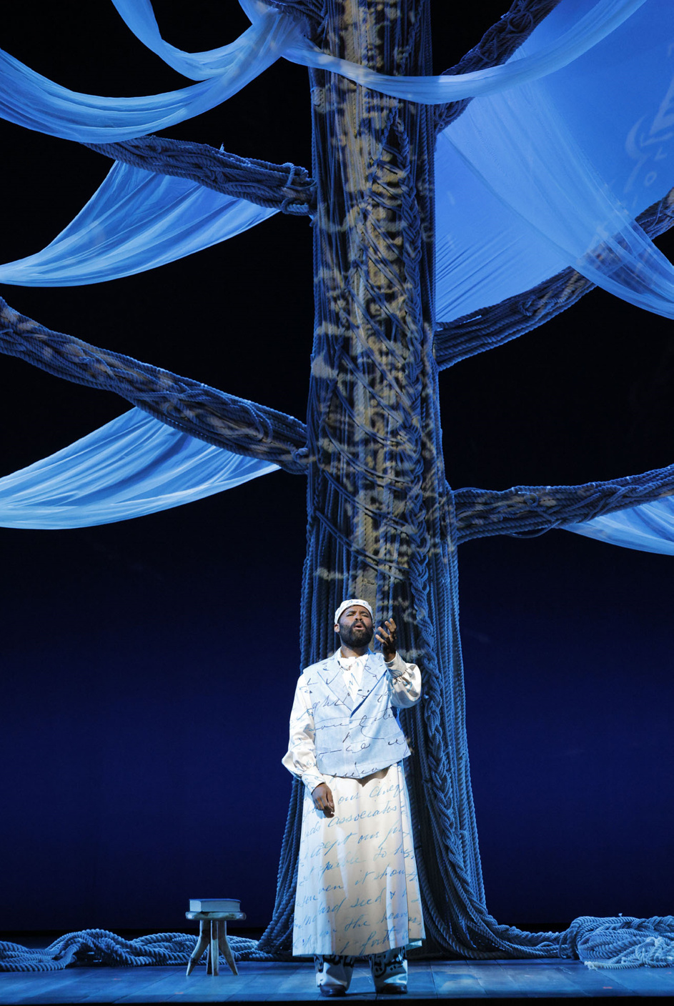 Omar (Jamez McCorkle) in front of the Act II tree