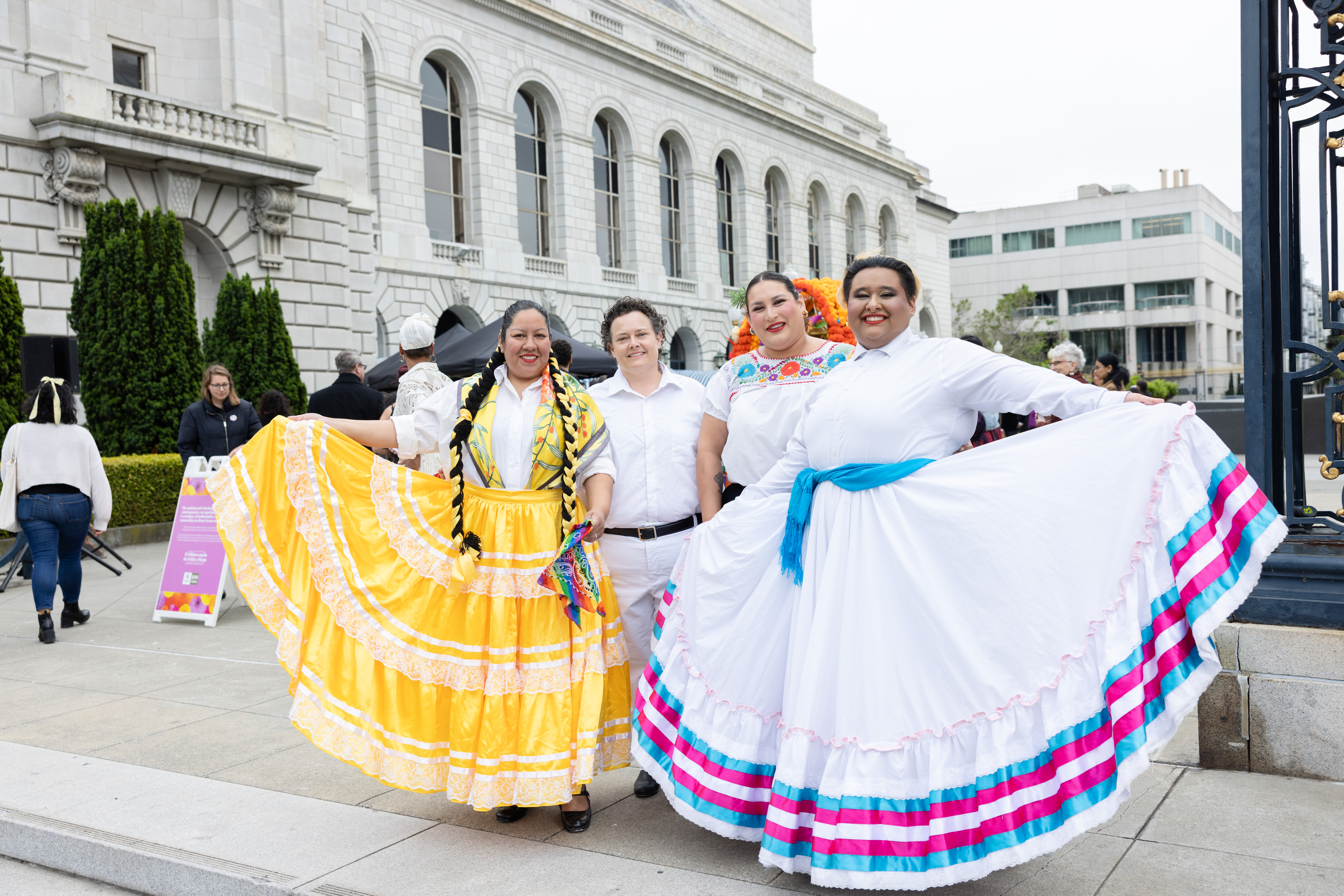 performers in colorful dresses