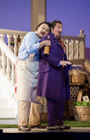 Nemorino receives the elixir of love in our 2008 production of The Elixir of Love