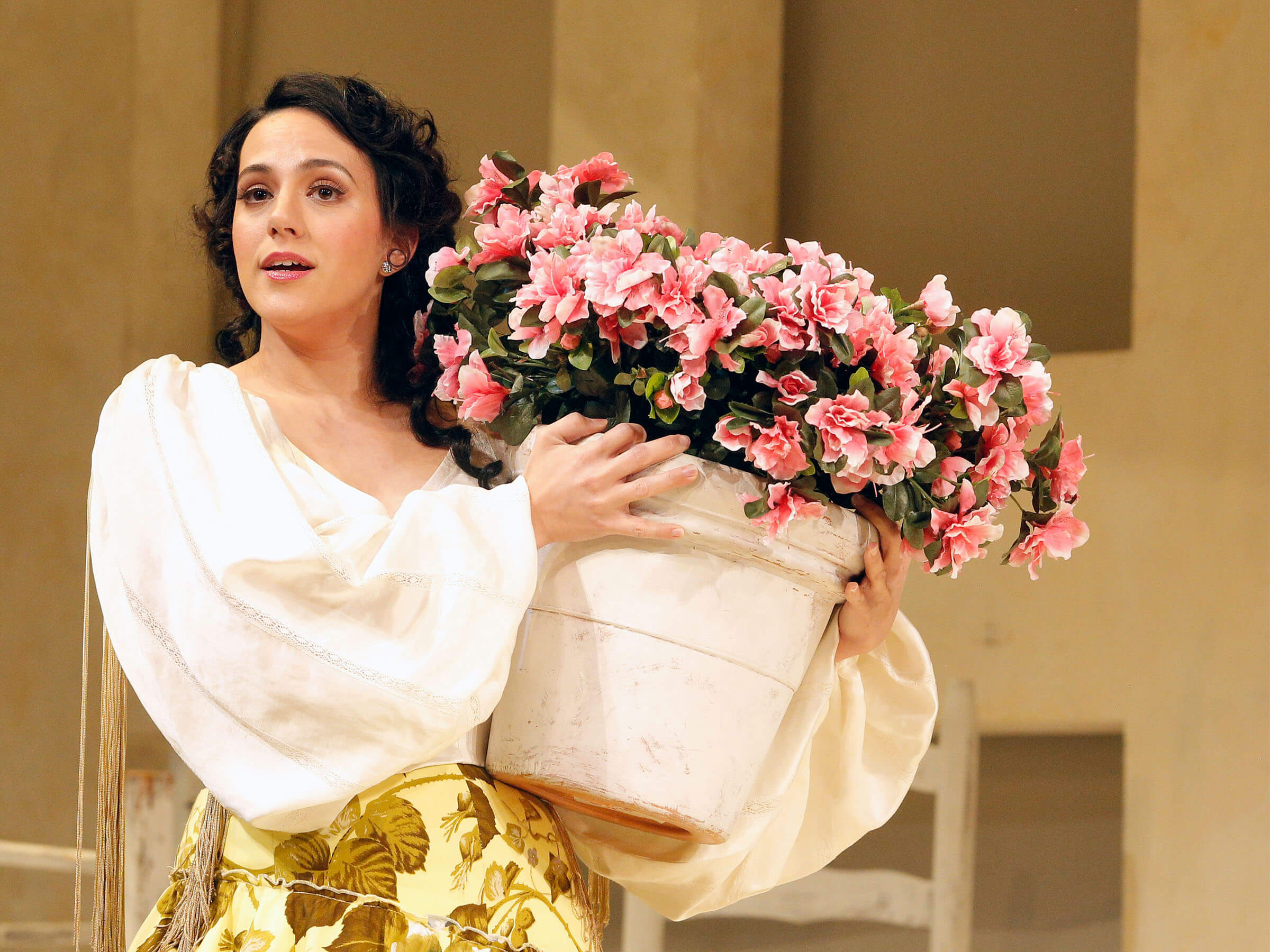 Daniella Mack holding a flower pot