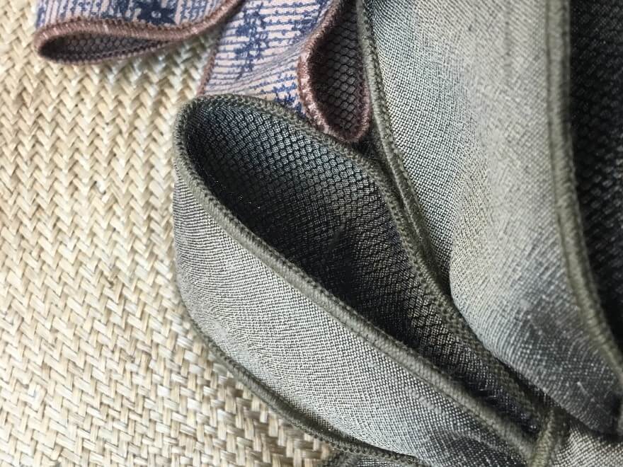 A close-up of a bow, showing the internal netting for structural stability.