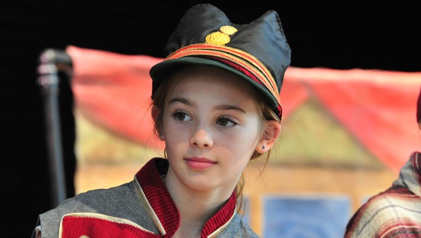 Young student in costume 