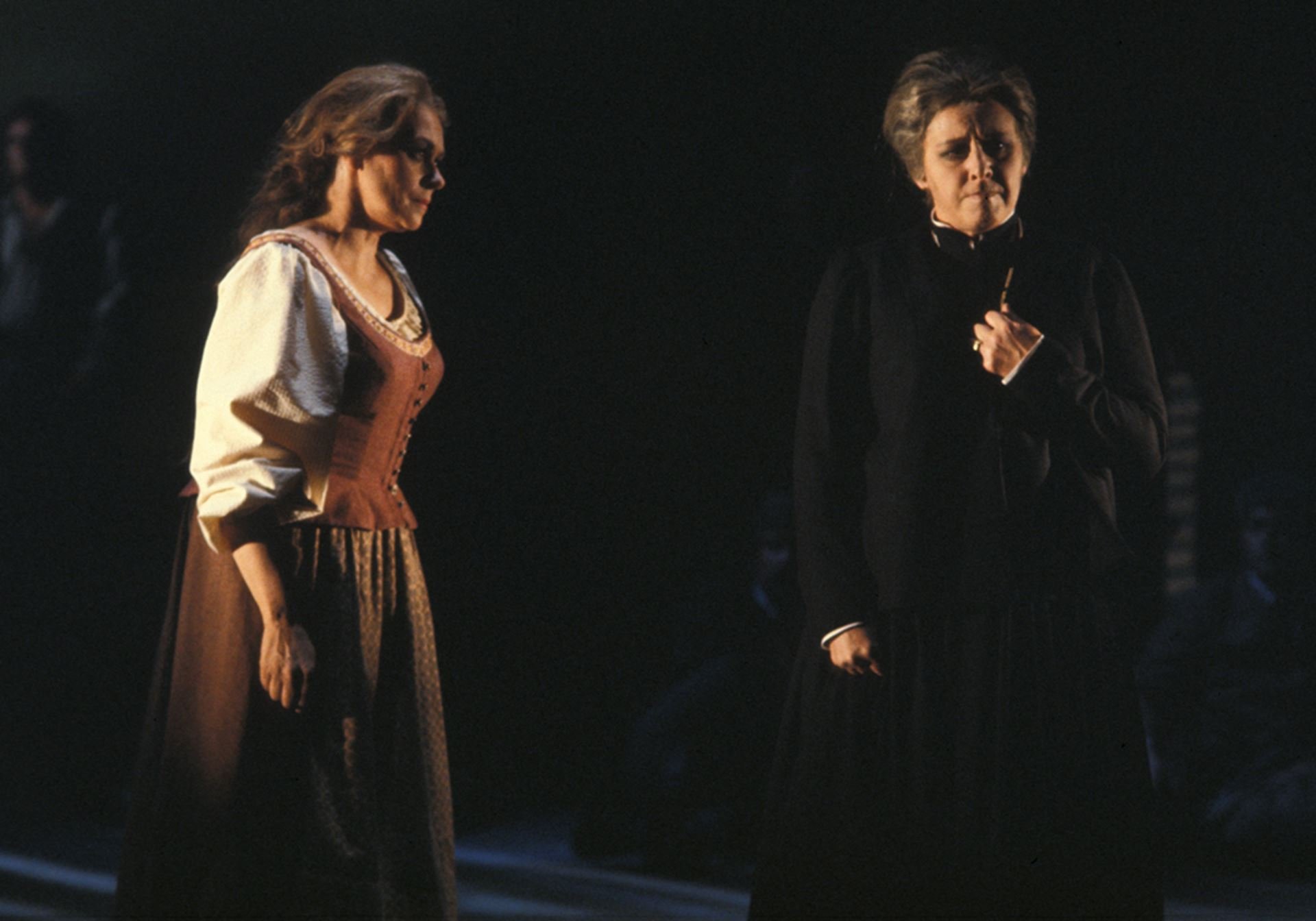 two women on stage performing opera.