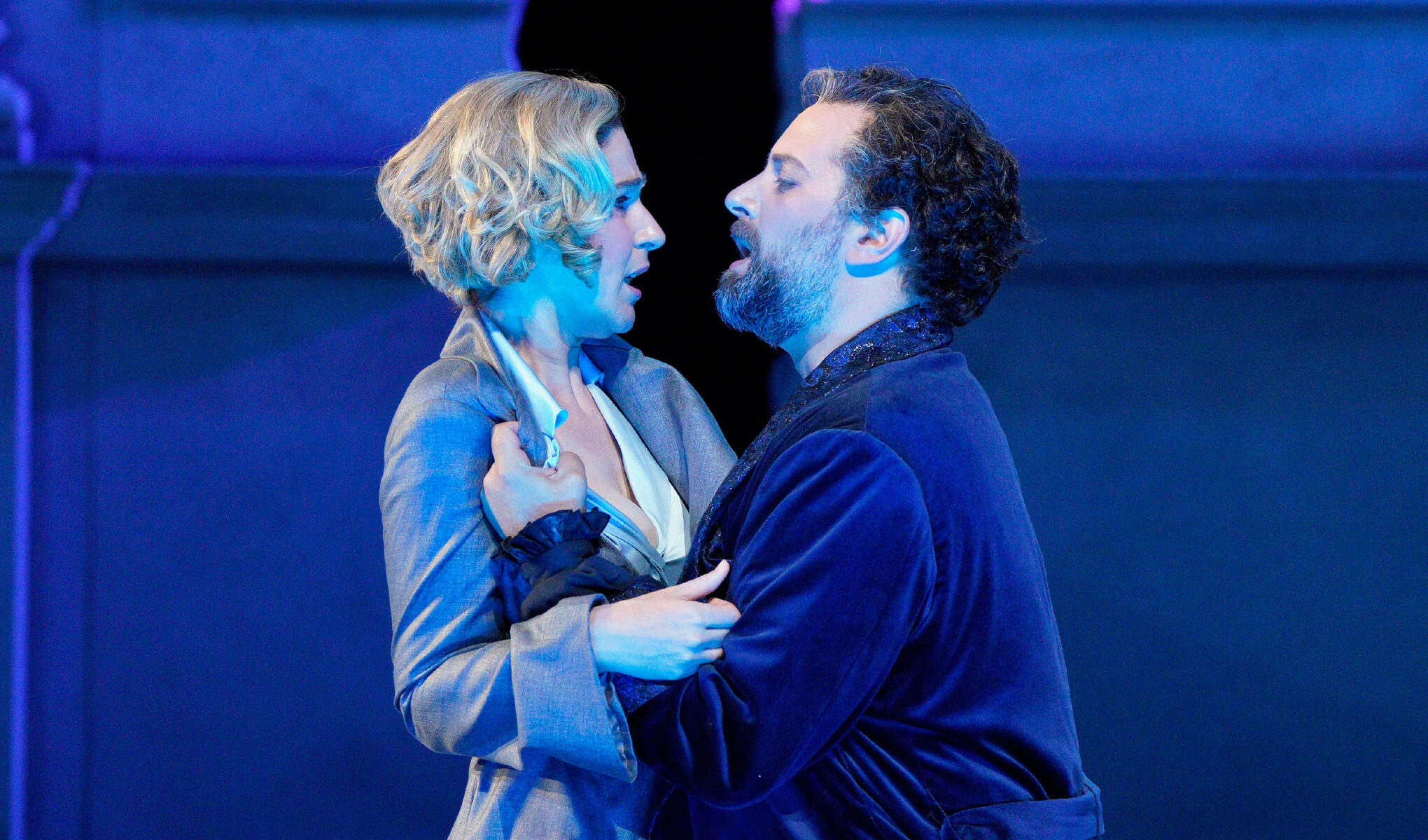 Don Giovanni aggressively grabbing a woman
