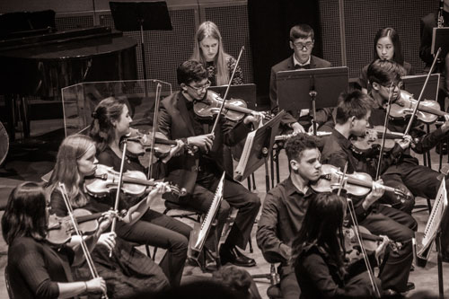 San Francisco Opera Orchestra's Jennifer Cho with RASOTA students in their showcase performance. Photo: Avi Glibicky.