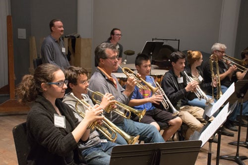 San Francisco Opera Orchestra's John Pearson rehearses with students from RASOTA. Photo: Scott Wall.
