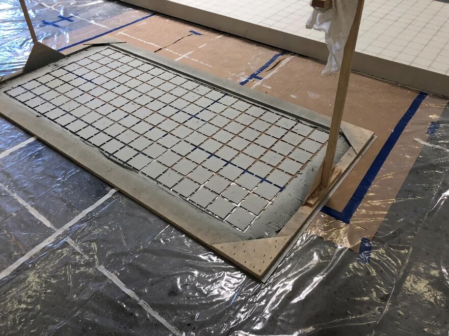 The table-sized stencil used to paint the graph lines onto the set was also created by the CNC router.