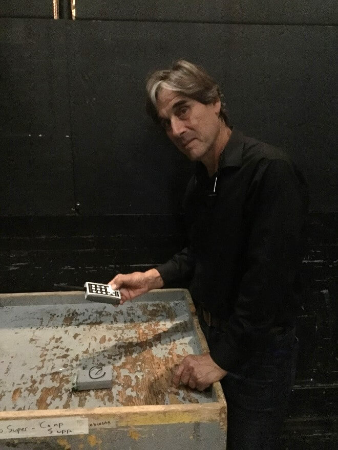 Setting the charges for the Fafner fight. 2) Geoff Heron with the remote control unit;