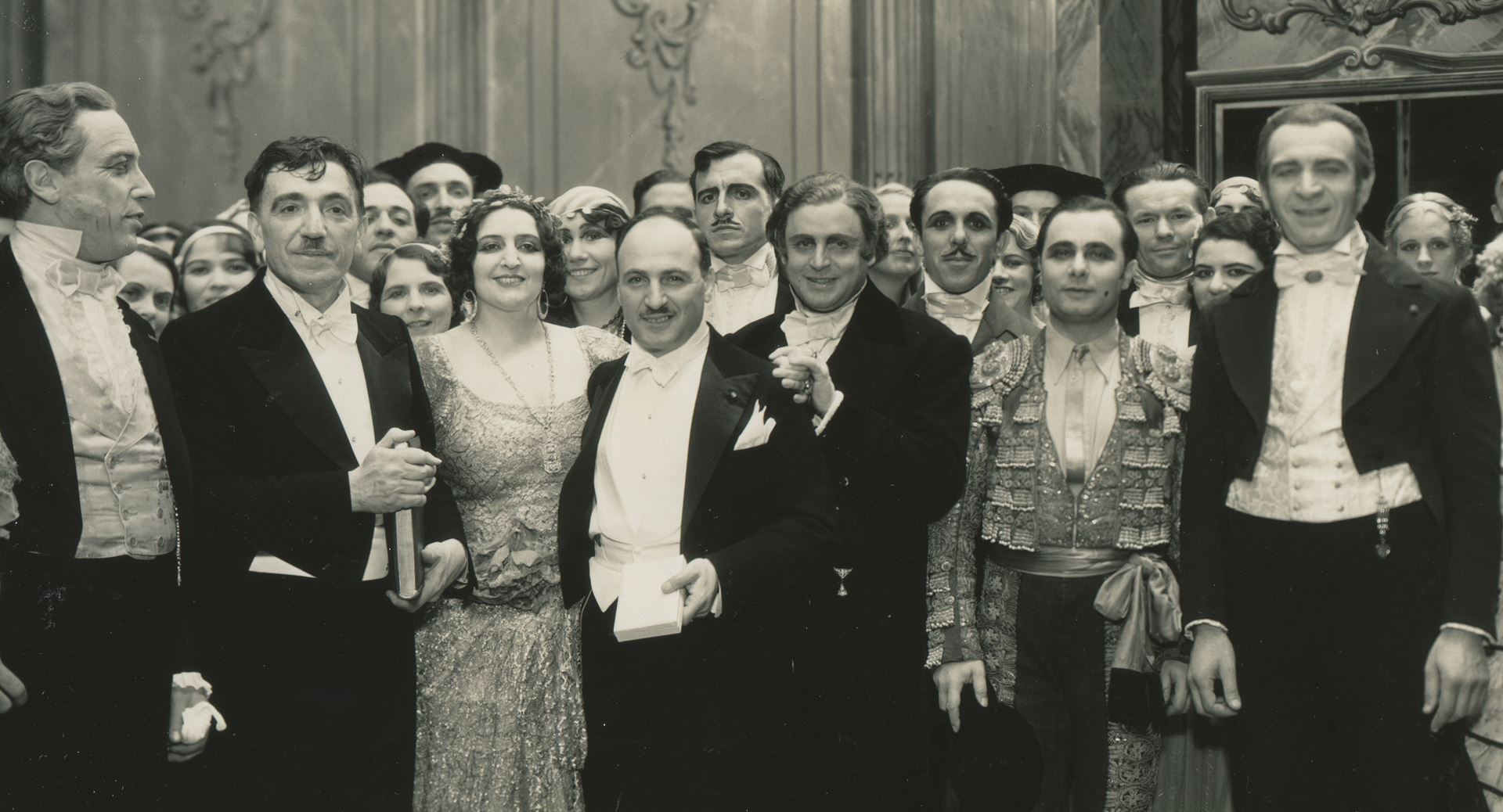 Black and white photo of opera attendees