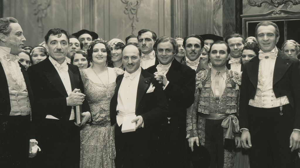 black and white photo of opera attendees