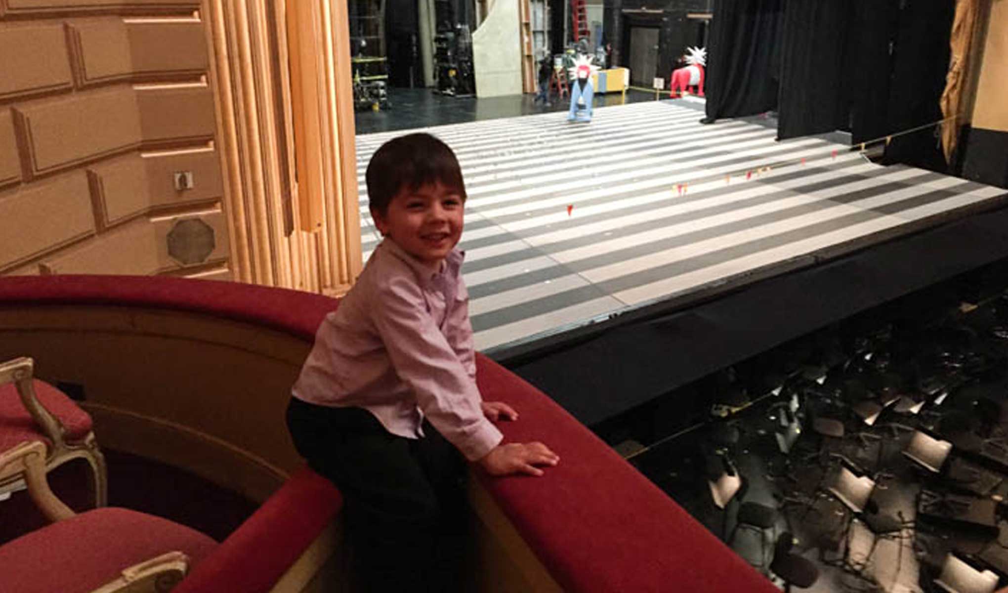 Nathaniel happy to be seeing his very first opera! Photo courtesy Bob Epstein.
