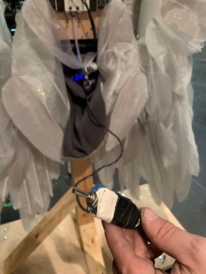 The mechanics of the wings: the full set up; the adjusters for air speed; the switch for the singers, and the small CO2 tanks (compare to the size of the safety pins!).