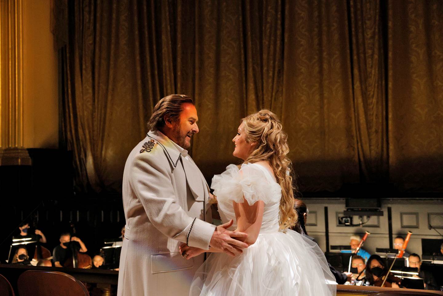 man and women looking at each other apparently as newlyweds