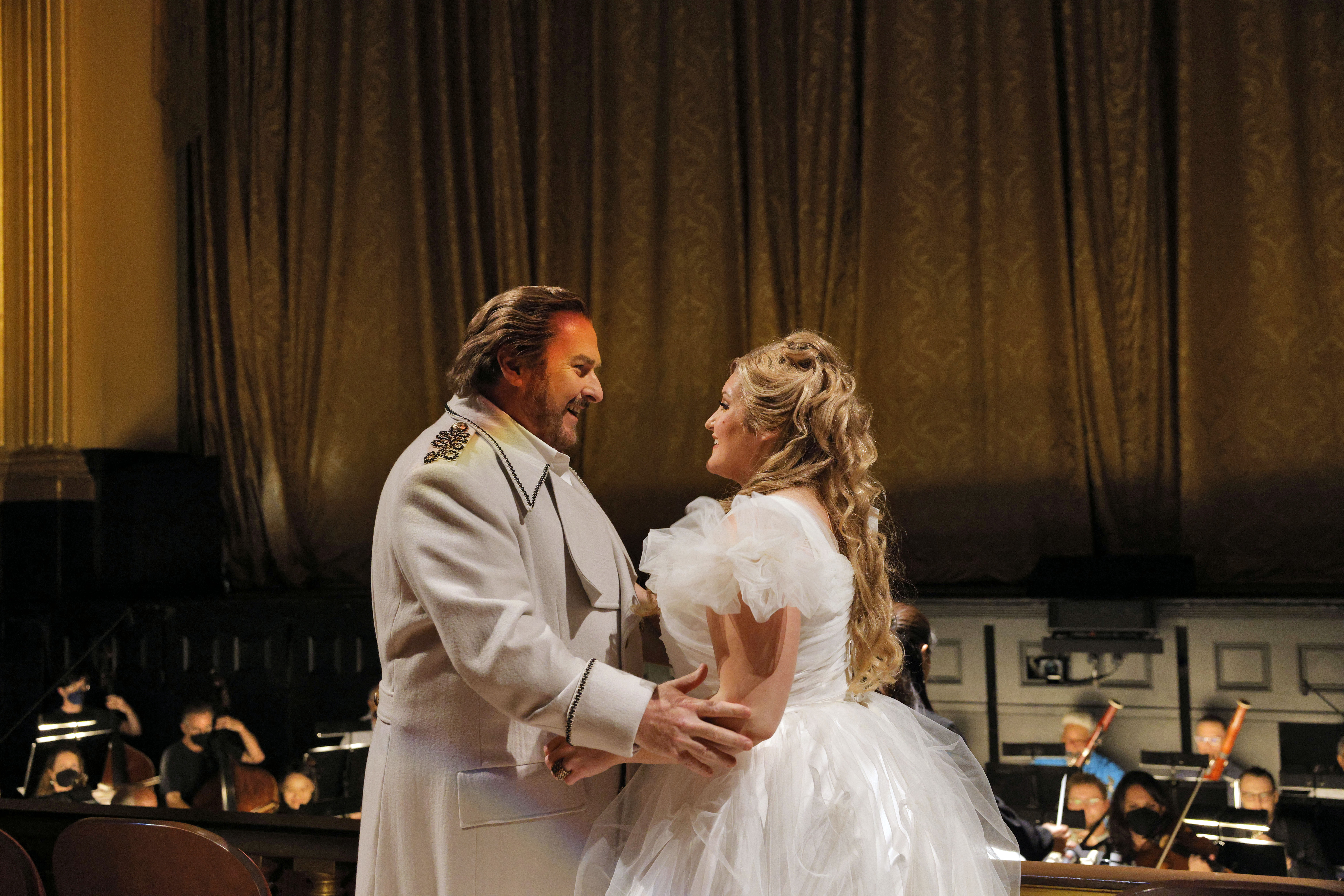 man and women looking at each other apparently as newlyweds