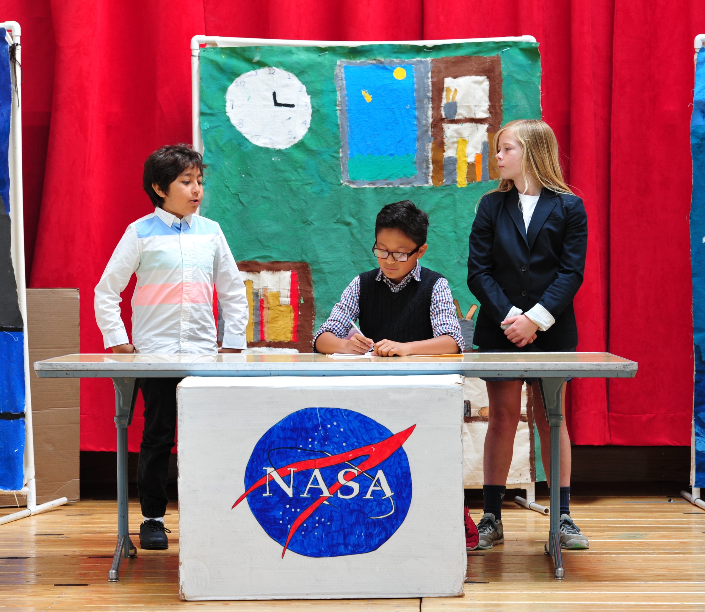 Students putting on a performance about NASA