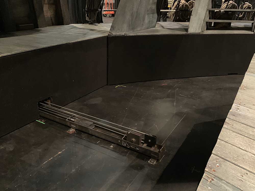 The hydraulic system that tracks the ship onstage and offstage. When the ship is pushed back, we refer to this area as &ldquo;the moat&rdquo;.