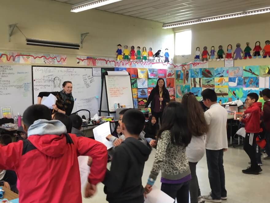 Katie and Ms. Carion in the classroom working on choreography.