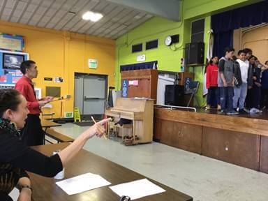 Katie and Mr. Won working together to help stage the opera.