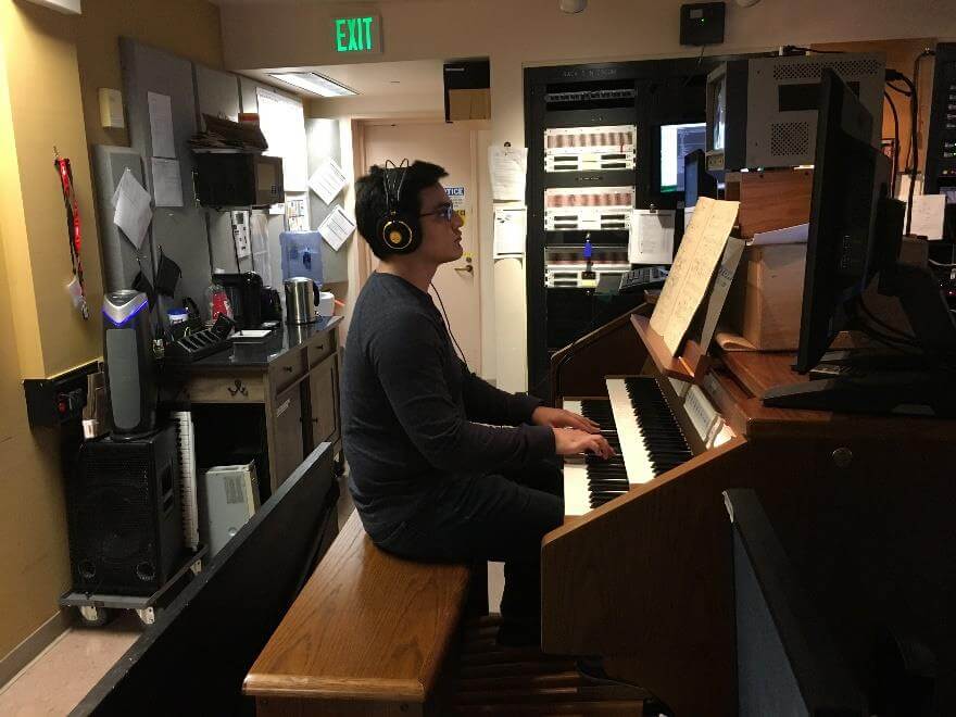 Adler Fellow C&eacute;sar Ca&ntilde;&oacute;n playing the organ during the Te Deum of Tosca.
