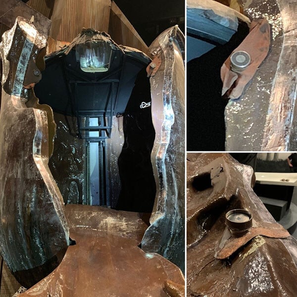 The middle picture shows the magnets that release to break open the door