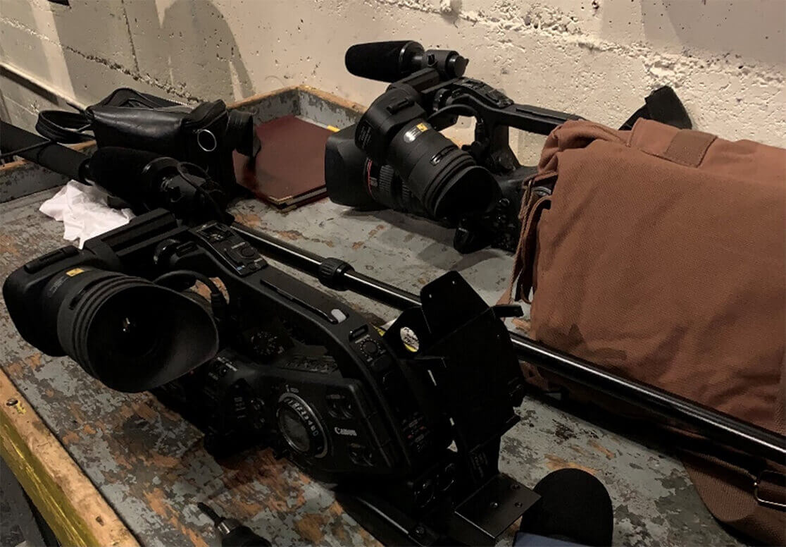 Prop cameras provided by the SFO sound department.