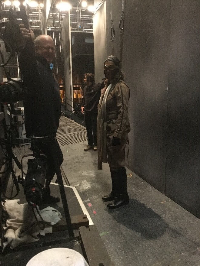 Waiting to be flown into the fly tower at the start of the opera.