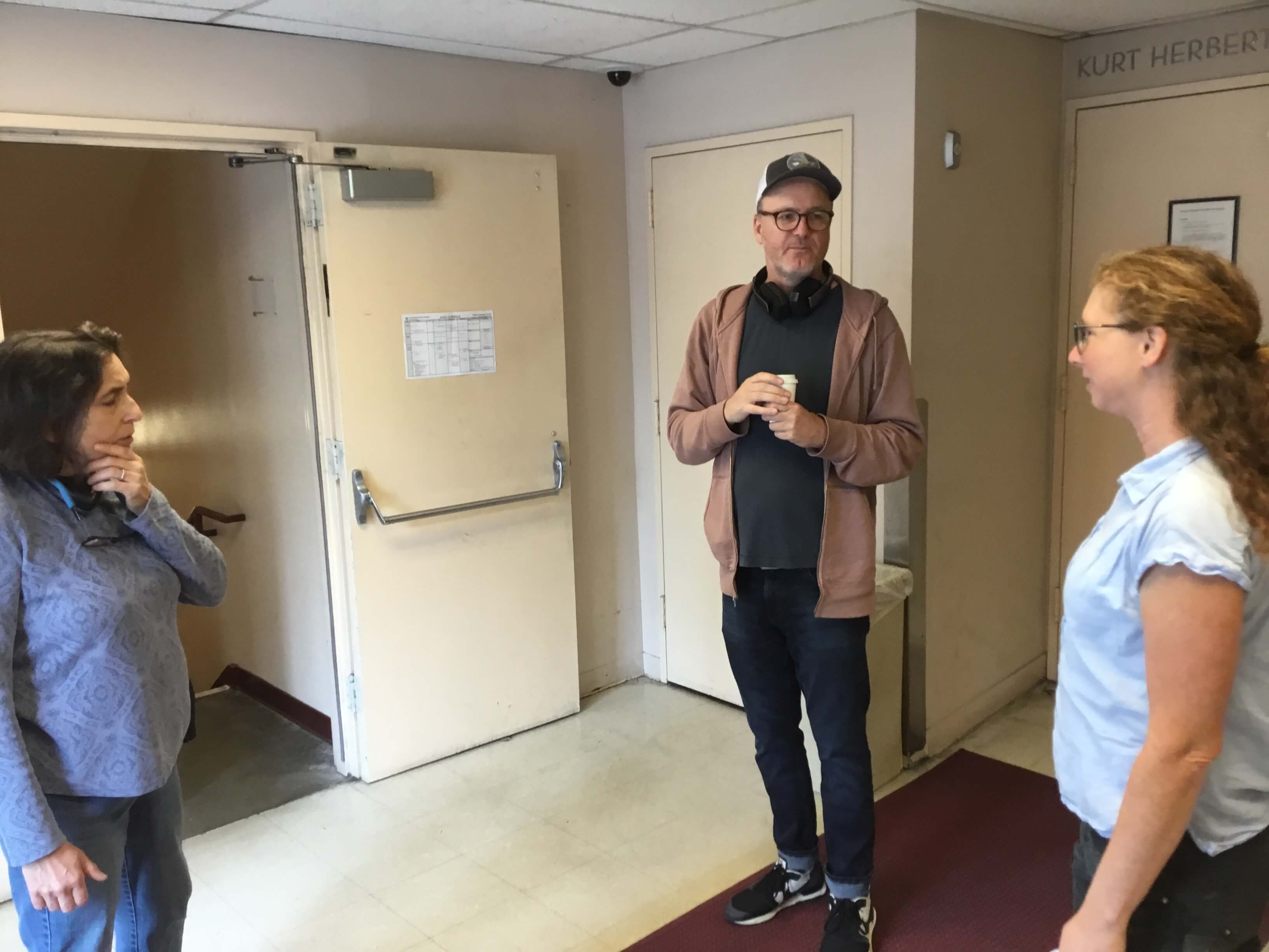 Lori Harrison, Robert Innes Hopkins and Sarah Shores in an impromptu meeting to talk about desk drawers; Patricia Hewett, Robert and Lori working out the arrangement of items in Scarpia&rsquo;s bribery haul in Act II.