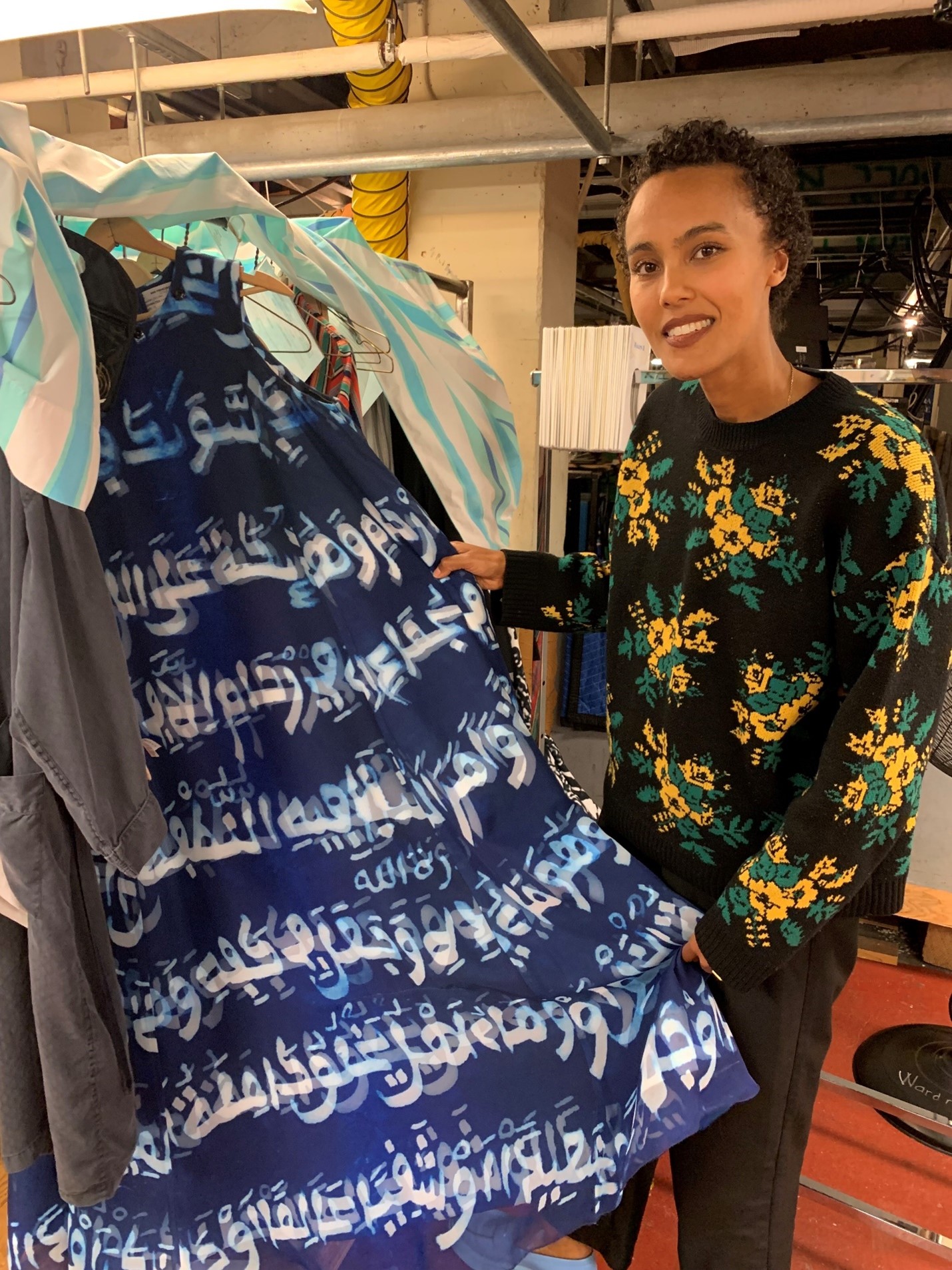 Director Kaneza Schaal with one of Omar&rsquo;s mother&rsquo;s costumes