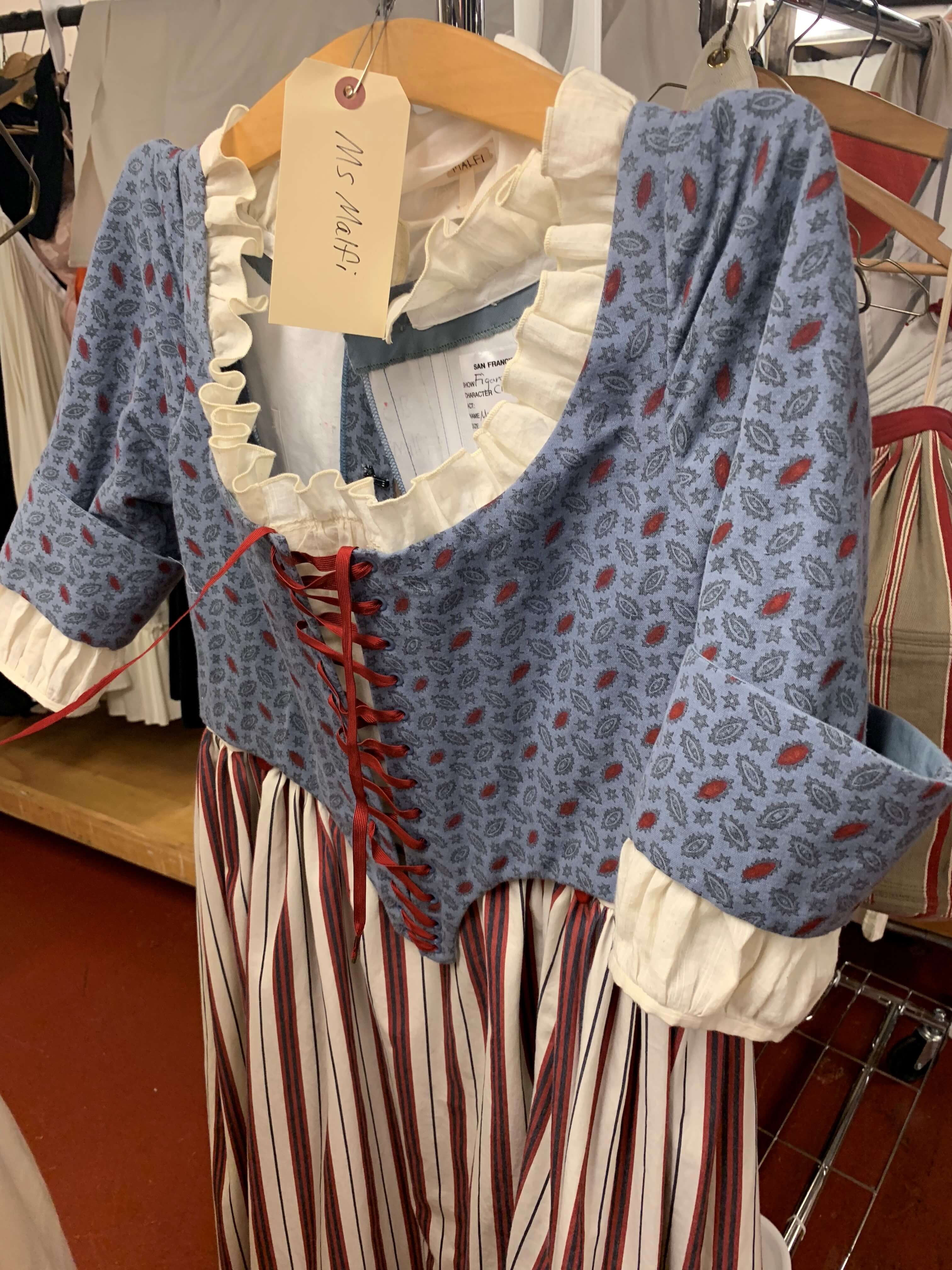 Cherubino&rsquo;s Act III costume before being used in the piano dress rehearsal.